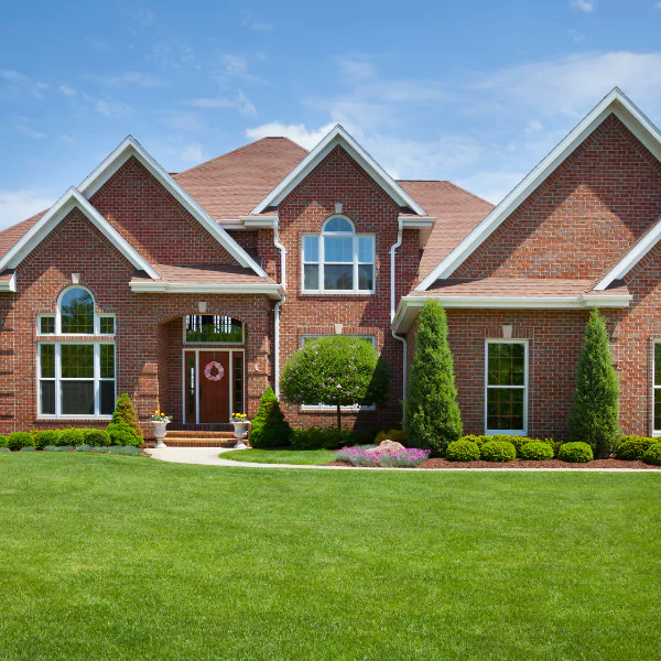 An image of a beautifully crafted brick facade enhancing a Knoxville homes curb appeal.