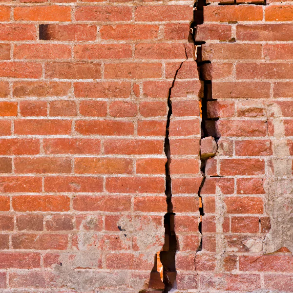 An image of cracked brick walls in Knoxville, TN.