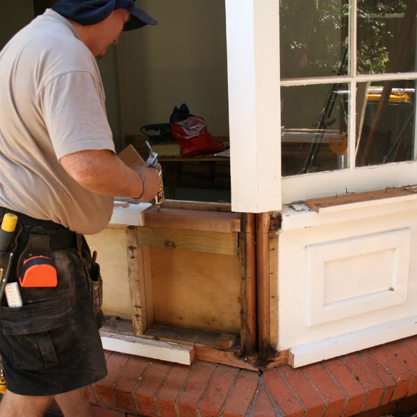 An image showing masonry repair work being done on a Knoxville home.